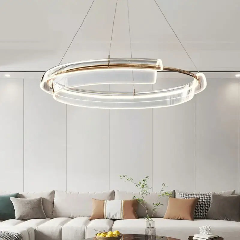 Modern double-ring pendant light with clear acrylic and gold-toned metal accents decorbites italian minimalist chandelier