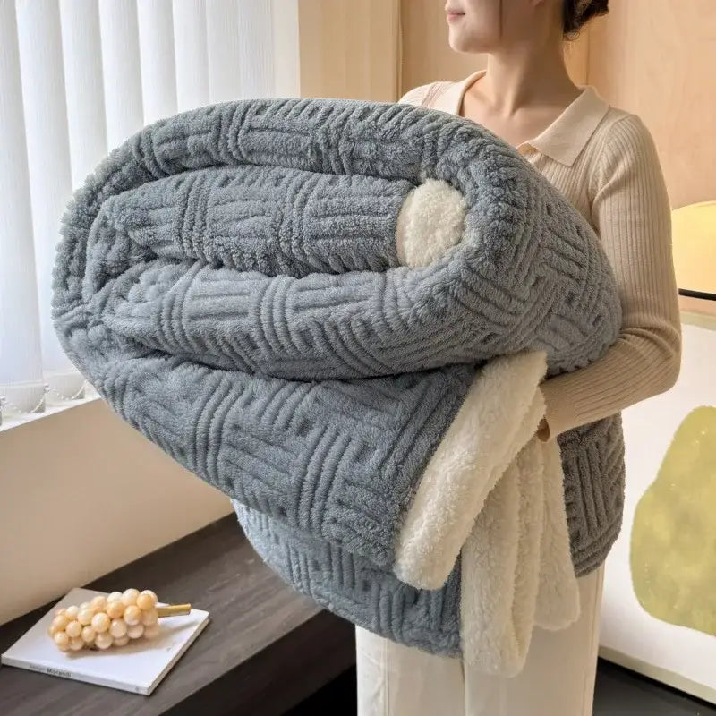 A cozy light blue decorbites jacquard lamb wool double-layer blanket with textured woven pattern and soft white fleece lining