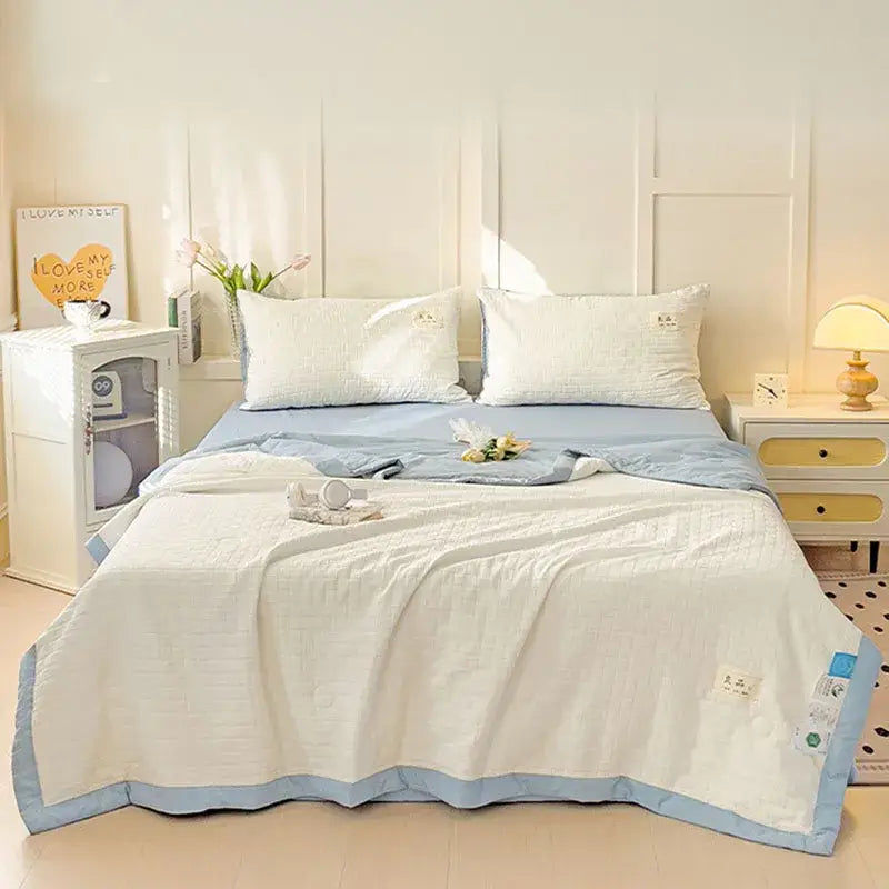 Soft white and light blue decorbites jacquard summer cool blanket with subtle textured weave bedroom quilt