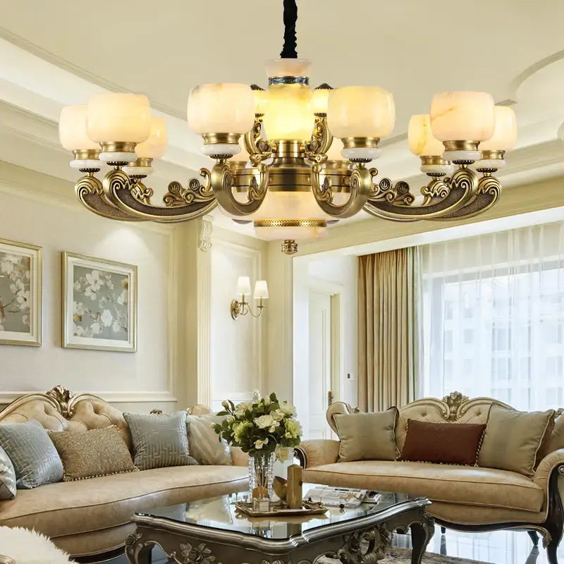 Gold-toned ornate decorbites jade chandelier with multiple frosted glass shades for living room lighting