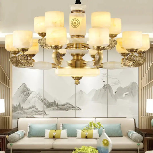 Gold-toned decorbites jade copper chandelier with frosted opal glass shades and ornate decorative elements for living room