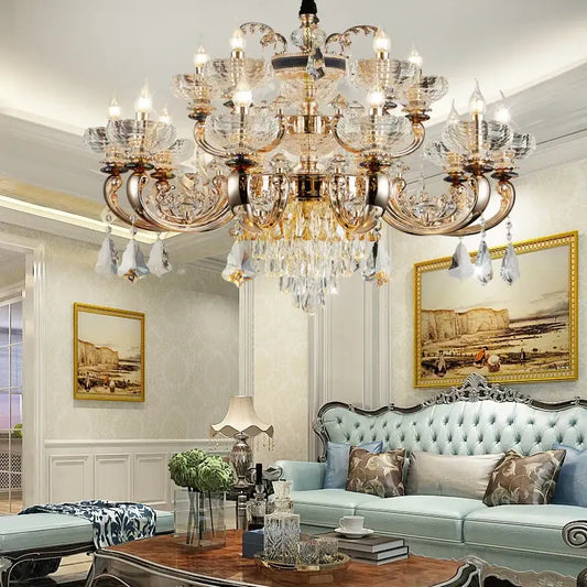 An ornate decorbites jade crystal multi-tiered chandelier with gold-toned metalwork and clear crystal accents