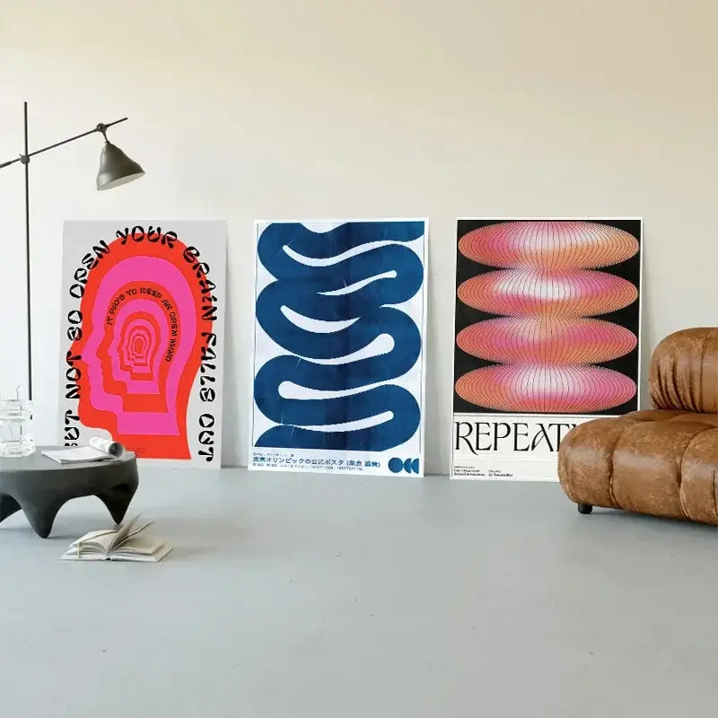 Three japanese abstract blue wave canvas prints with vibrant pink and blue designs on white backgrounds by decorbites