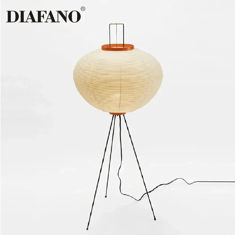 Diafano floor lamp with a cream japanese style paper lantern shade and black metal tripod legs for living room lighting