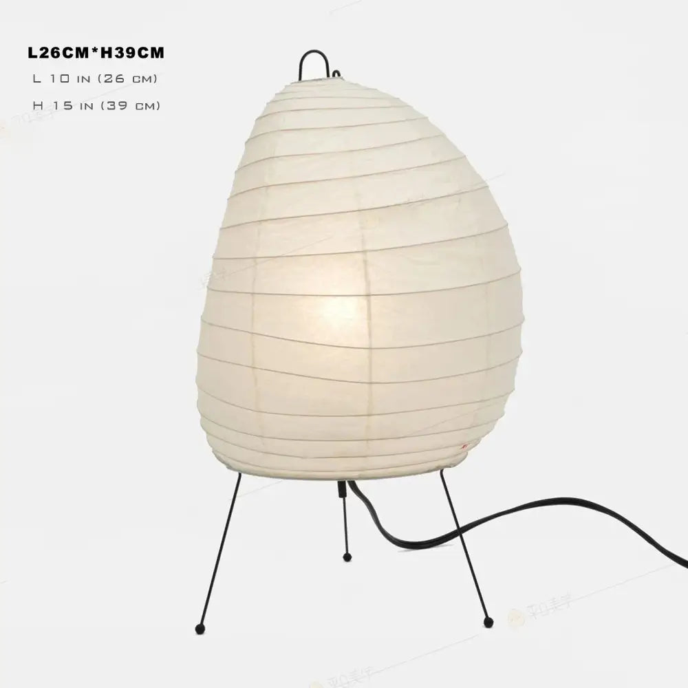 Cream-colored decorbites japanese style paper floor lamp with black metal tripod base for living room lighting