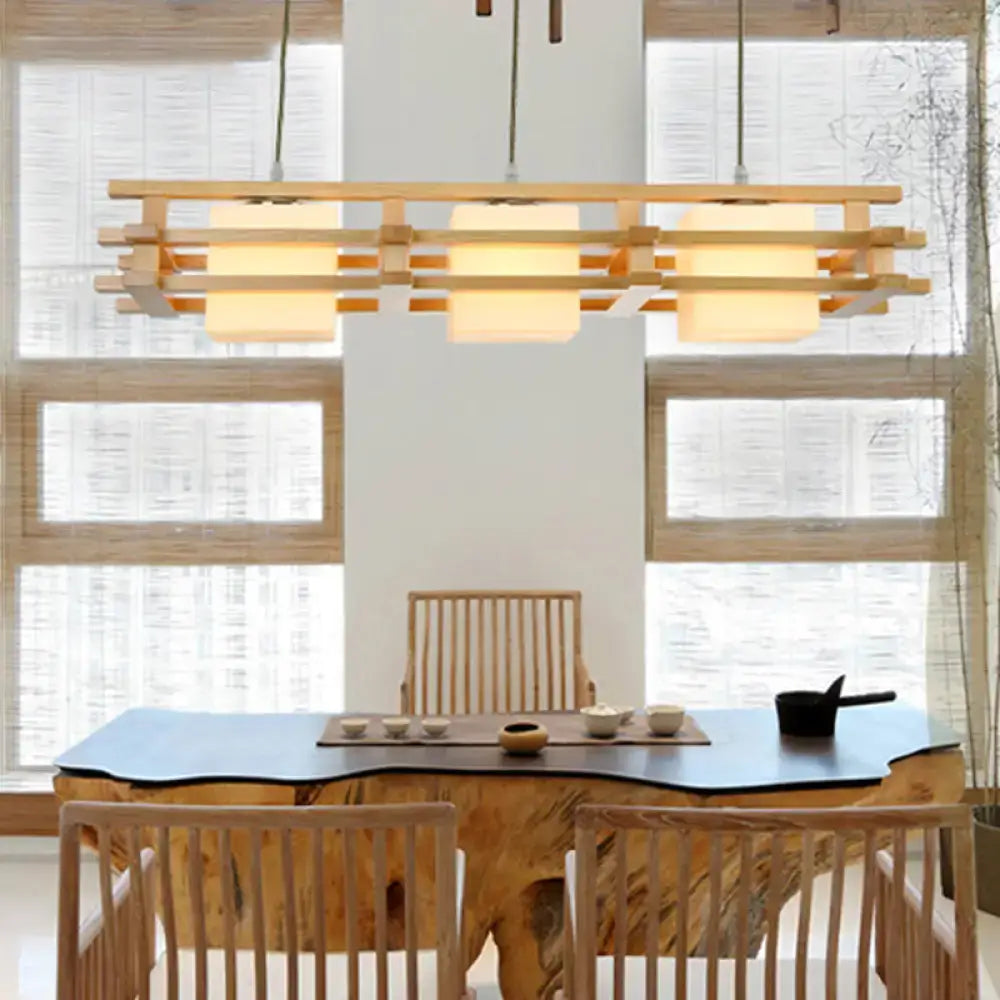 Modern wooden pendant light with rectangular frosted glass shades and minimalist geometric design for restaurant use