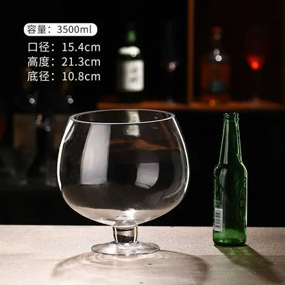 Clear glass decanter with wide rounded bowl and short stem for decorbites jumbo party jumbo party glasses use
