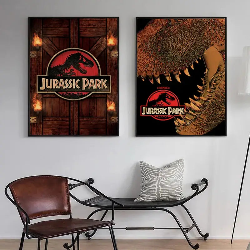 Two framed jurassic park dinosaur canvas posters featuring the iconic logo with flames and a t-rex close-up