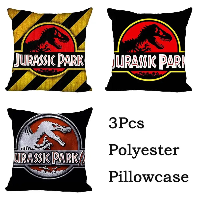 Three decorbites jurassic park dinosaur polyester pillowcases in red black and yellow featuring iconic park dinosaur logos