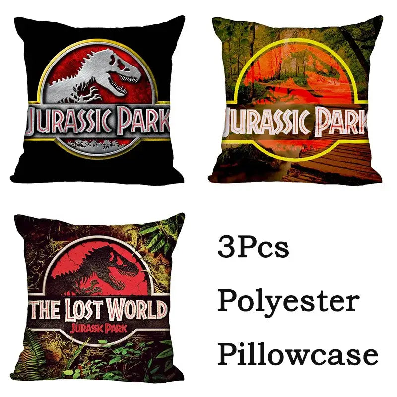 Set of three decorbites jurassic park dinosaur polyester pillowcases with iconic logos on black, green, and red backgrounds
