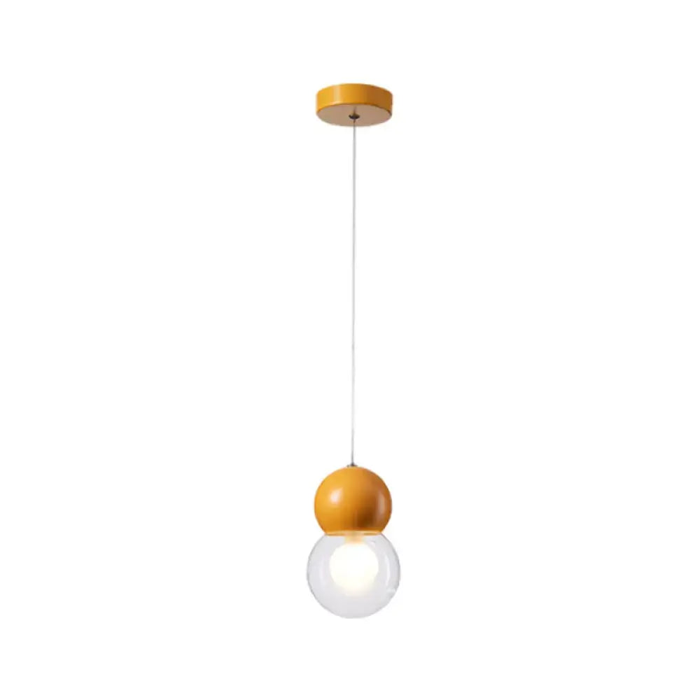 Decorbites™ kids bedside pendulum light with warm yellow wooden top and clear glass globe macaron ceiling pendant