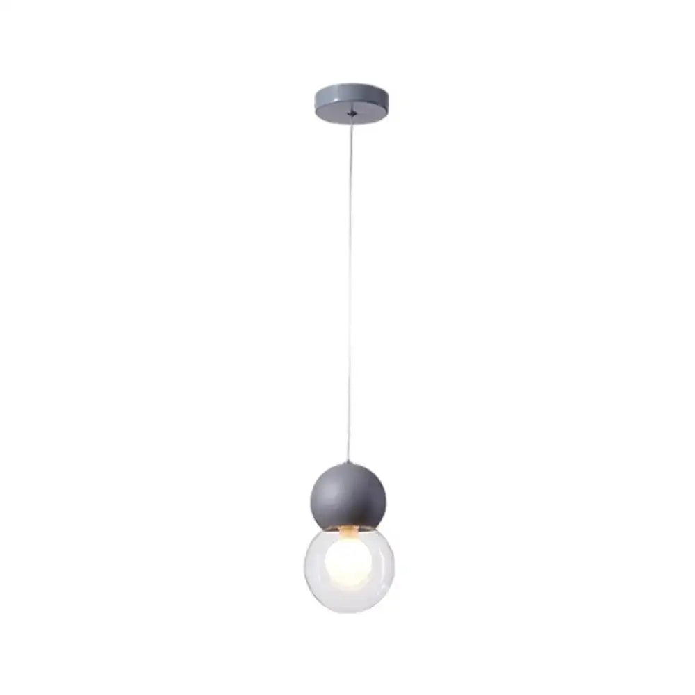 Decorbites kids bedside pendulum light with matte gray spherical top and clear globe macaron ceiling pendant
