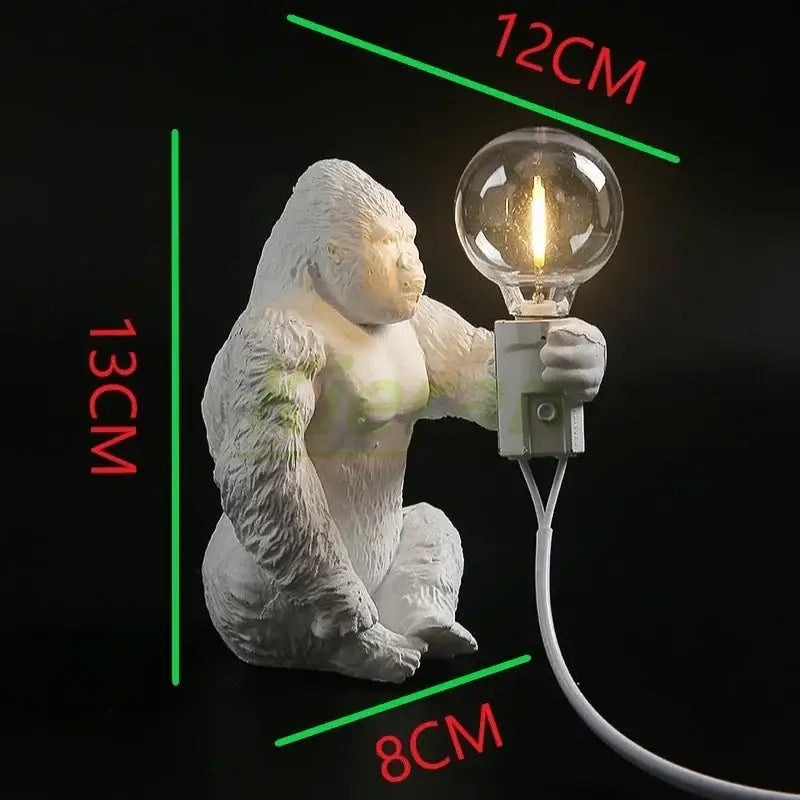 White ceramic decorbites king kong led desk lamp with textured surface holding exposed filament bulb for living room use