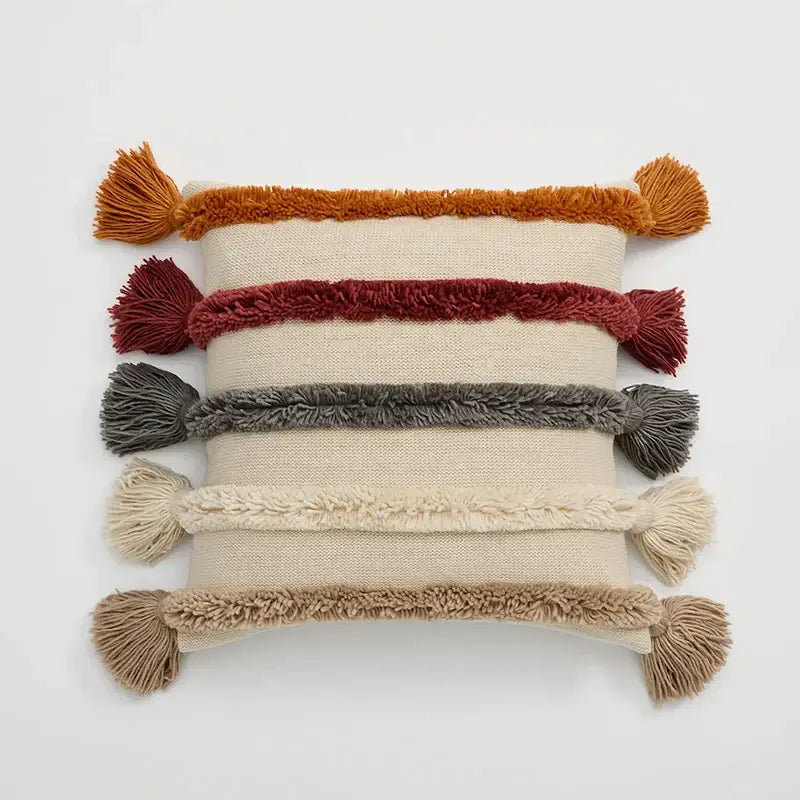 Stacked decorbites knit boho cushion covers with textured tassel-trimmed horizontal bands in beige for living room decor