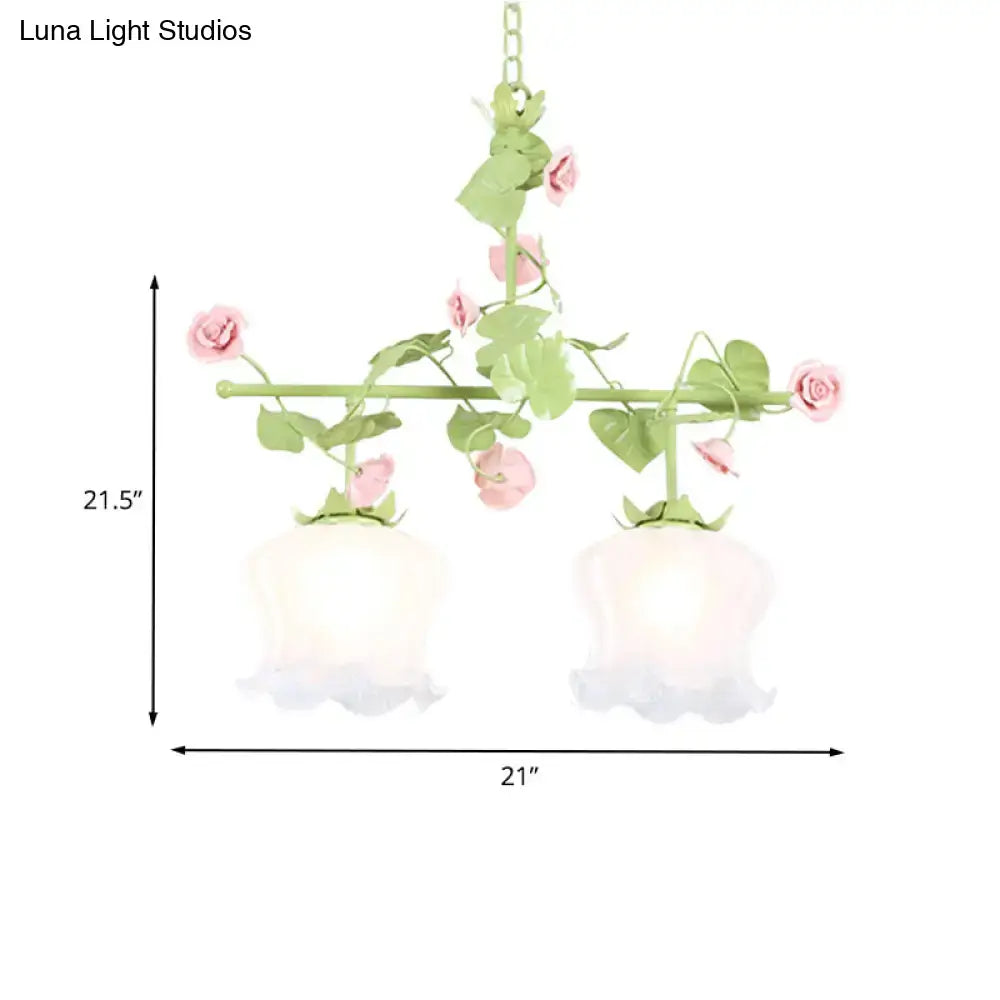 Pastel pink and green floral korean garden hanging light fixture with two frosted white glass shades and bulb base details