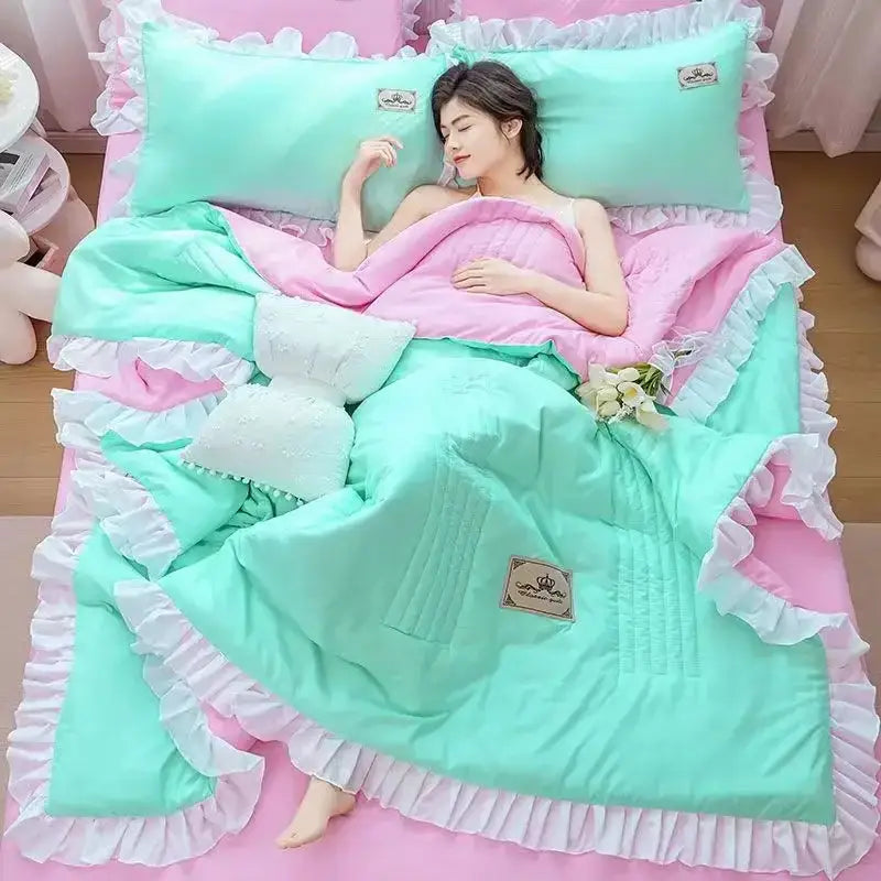Pastel mint and pink ruffled quilted comforter set with white lace trim from DecorBites korean princess ruffles collection