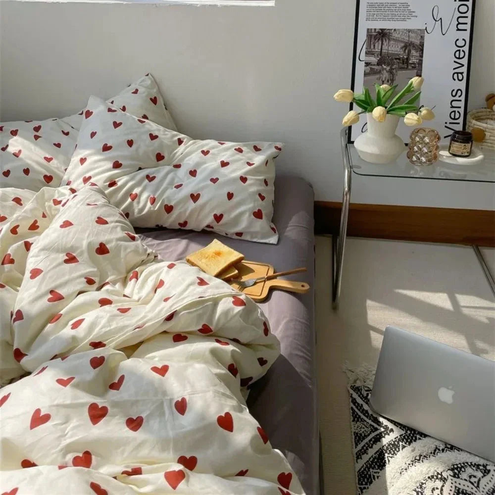 Cream-colored korean style duvet cover bedding set with red heart pattern made from soft cotton fabric by DecorBites