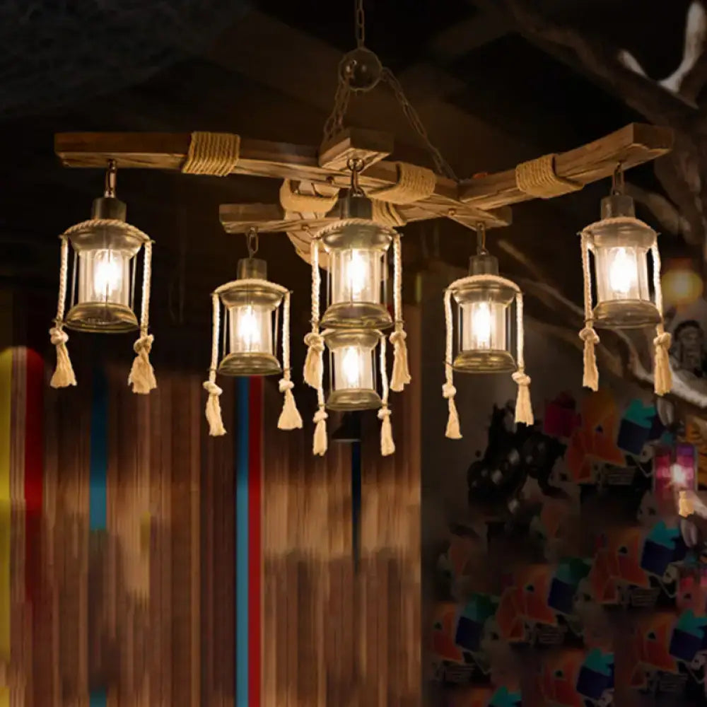Rustic wooden DecorBites™ lantern restaurant island light with five clear glass lanterns featuring beige rope and tassels compatible with led incandescent fluorescent bulbs