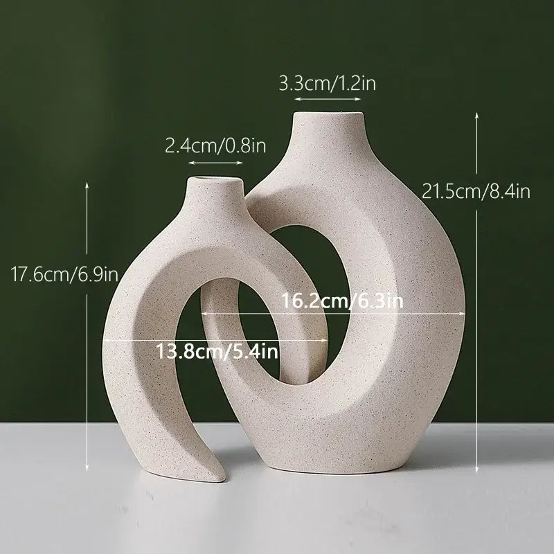 Cream-colored large 21cm capiron ceramic vase with speckled texture and abstract curved designs for home decor