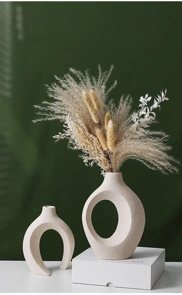 Cream-colored ceramic vase with circular cutout and smooth contours for home decor large 21cm decorbites™ capiron