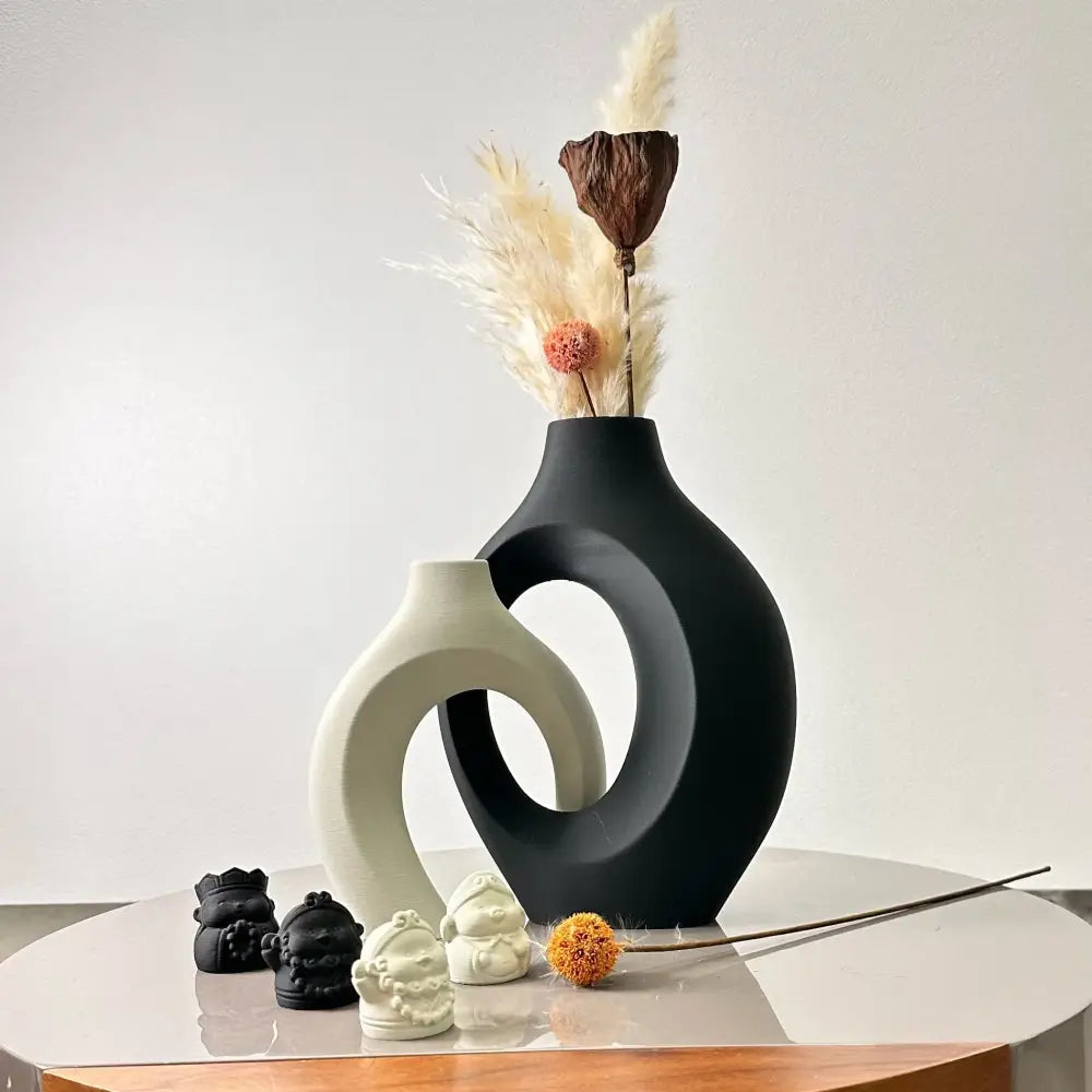 Black ceramic large dried vase with bold modern circular cutout design from decorbites™ dried vase set for home and office