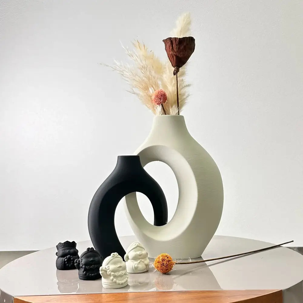 Cream-colored ceramic large dried vase with bold modern circular cutout design from DecorBites dried vase set for home and office
