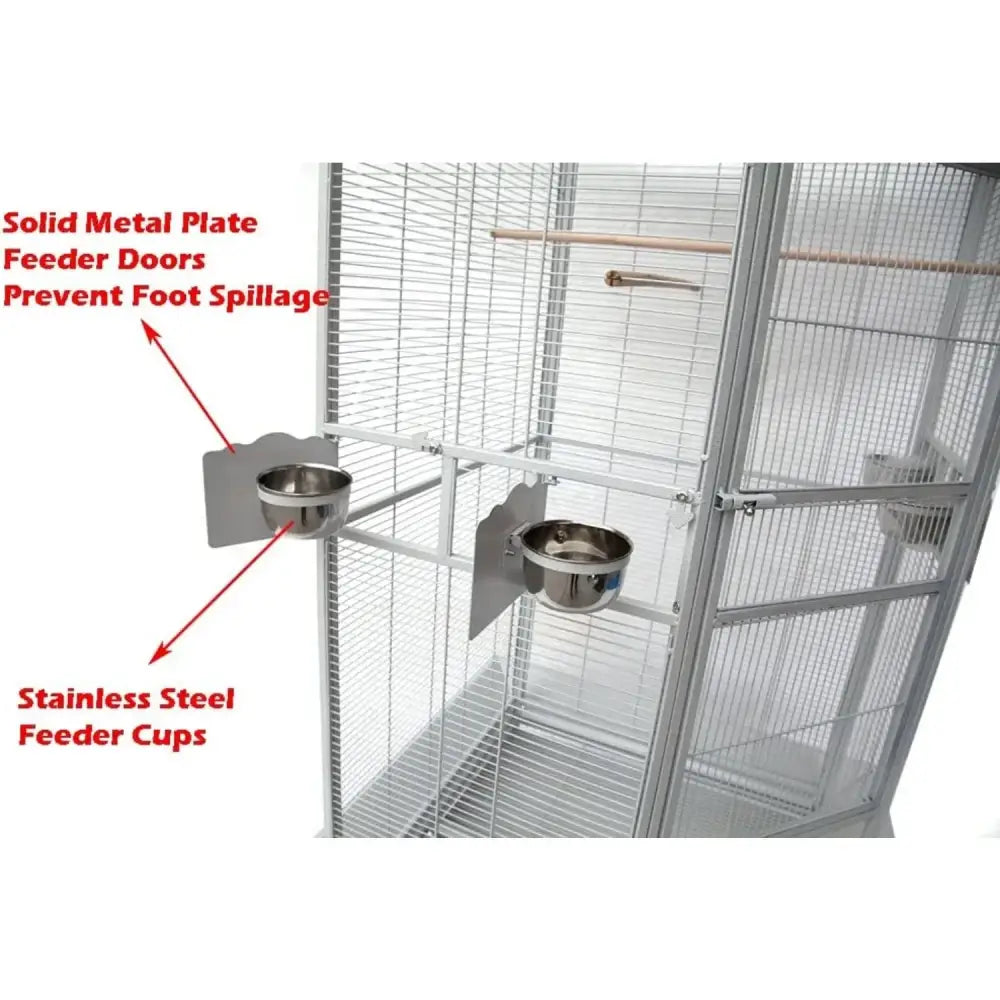 Stainless steel feeder cups mounted on metal plates in the decorbites wrought iron large parrot cage with rolling base