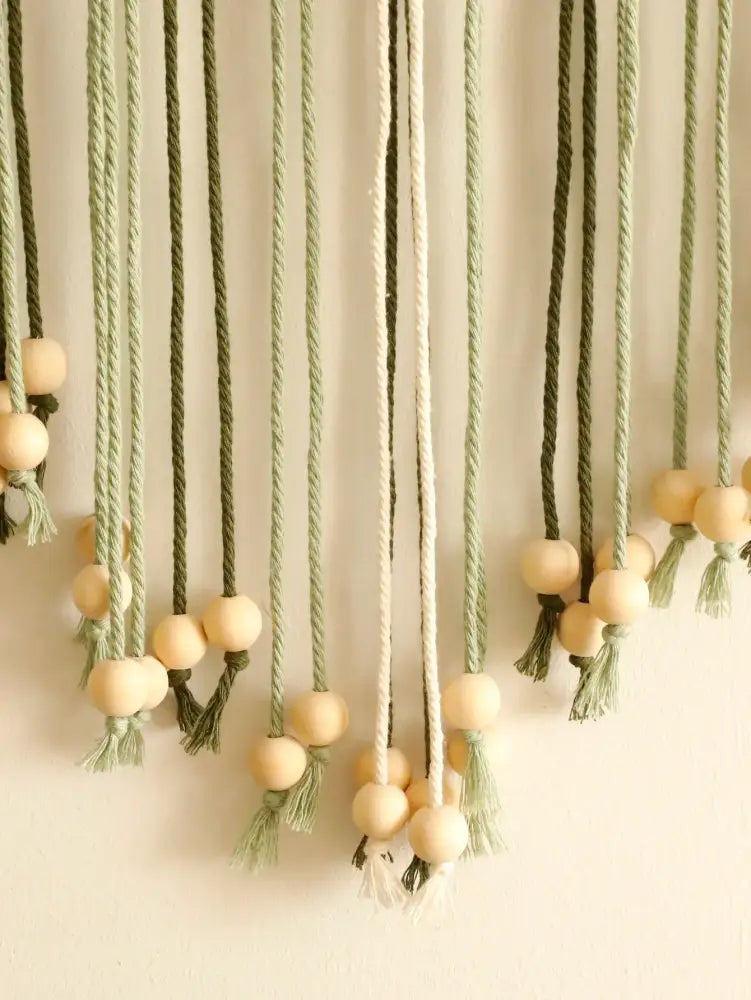 Decorbites™ leaf macrame wall hanging with sage green and cream cords natural wooden beads and tassels for home decor