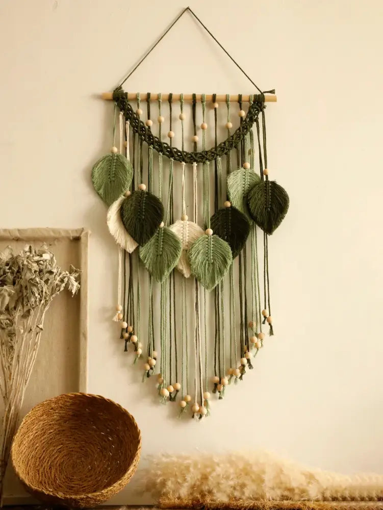 Decorbites™ leaf macrame wall hanging with green and cream woven leaf charms on wooden dowel with beads for boho decor