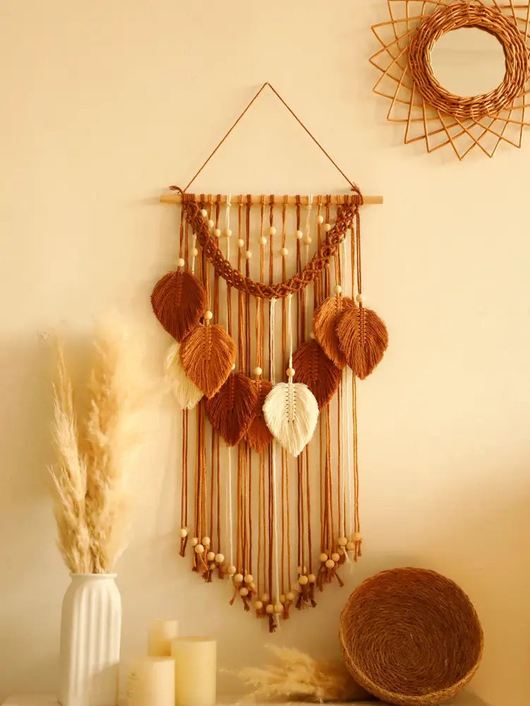 Decorbites™ leaf macrame wall hanging in earthy brown and cream tones with woven leaves and wooden beads for boho decor