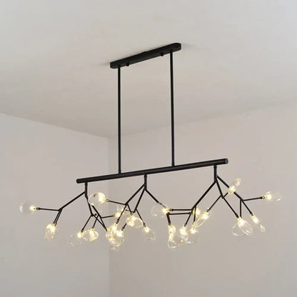 Black metal leaf-shaped island chandelier with branching arms and clear glass globe bulbs for bedroom 110v-120v 220v-240v