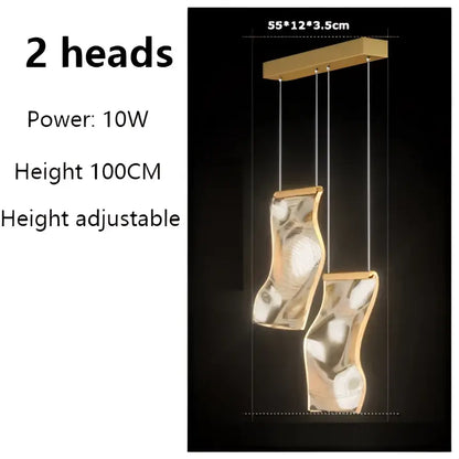 Gold-toned sculptural LED ceiling chandelier with two hanging heads for modern living room lighting by DecorBites™