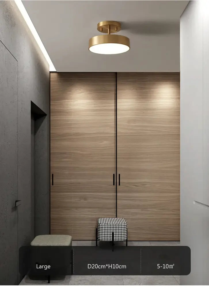Gold-toned circular led ceiling light with sleek modern design from decorbites for bedroom and living room use