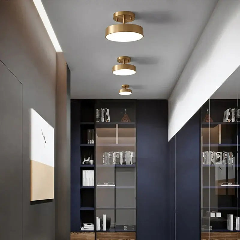 DecorBites™ led ceiling light featuring three modern gold-toned circular lights with a minimalist design for bedroom use