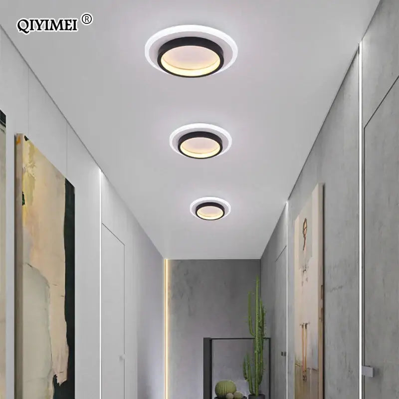 Modern round decorbites led ceiling lights with black outer ring and warm yellow illumination for bedroom kitchen