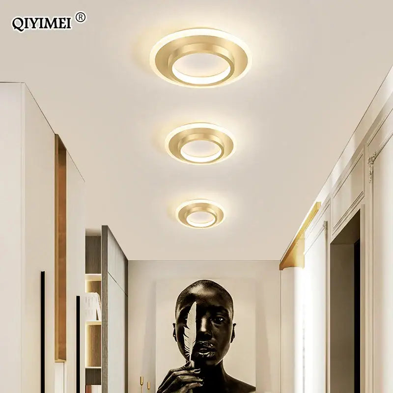 Three circular gold-toned decorbites led ceiling lights with modern minimalist design for bedroom kitchen lighting