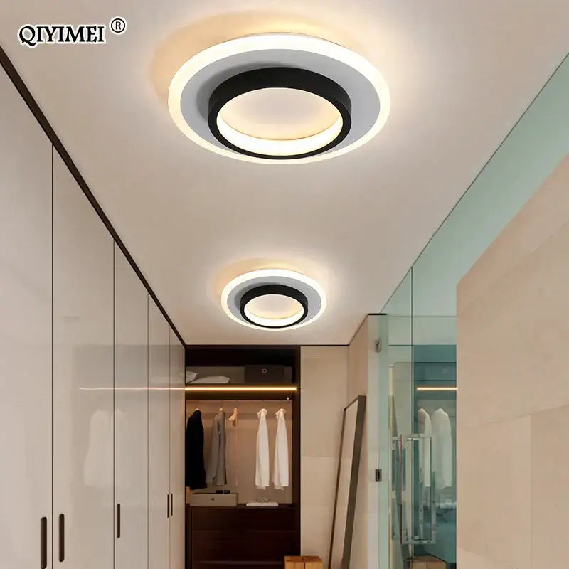 Modern decorbites led ceiling lights with sleek black and white circular design and warm ambient illumination rings