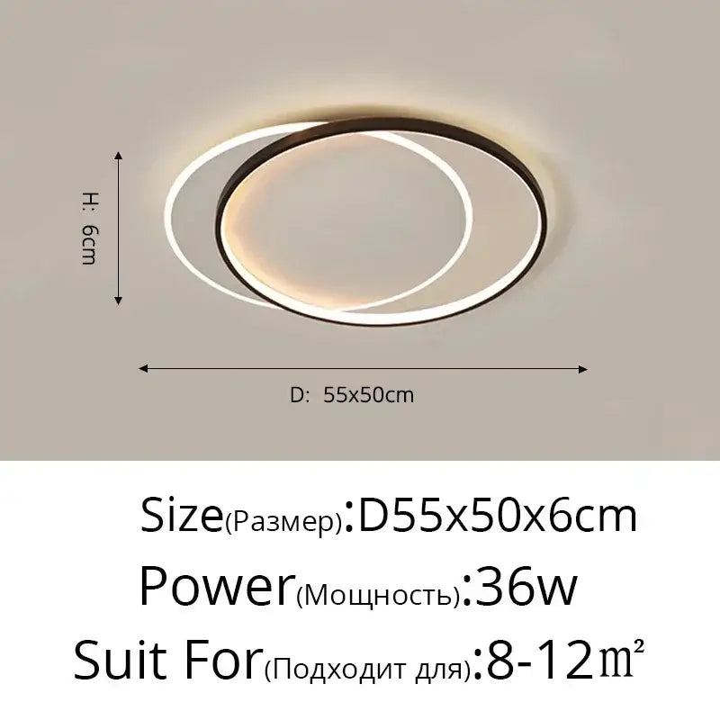 Modern double-ring decorbites led ceiling light with sleek black and white frame emitting warm ambient illumination