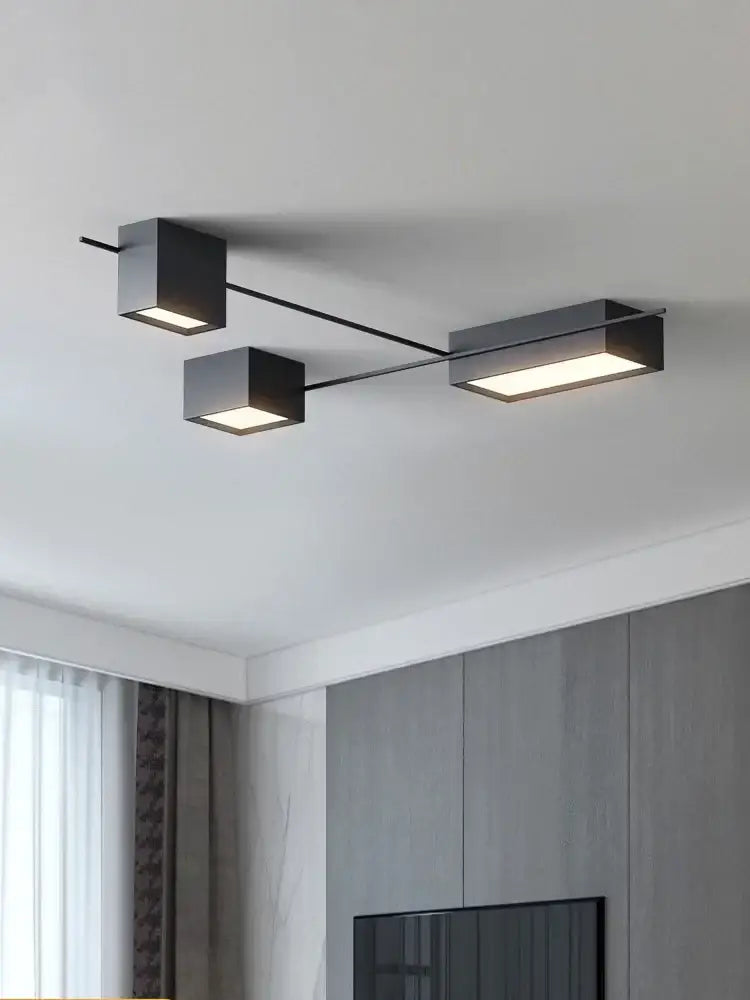 Modern black rectangular decorbites led ceiling lights with three illuminated cube-shaped bulbs for living room and bedroom