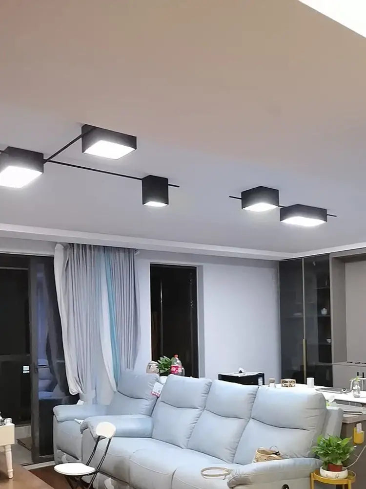 Modern black square decorbites led ceiling lights with sleek metallic arms for living room and bedroom lighting