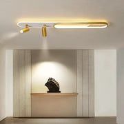 Modern gold-finished decorbites led ceiling light with integrated led strip and two adjustable spotlights for indoor use