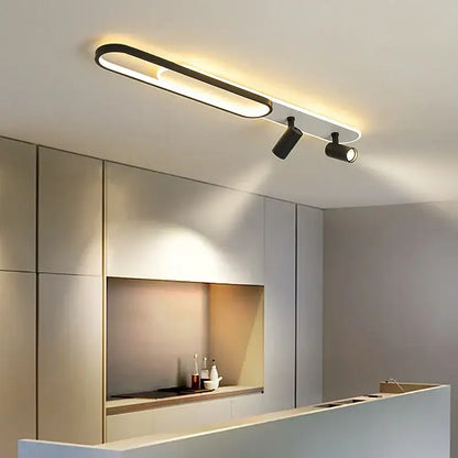 Modern black decorbites led ceiling light with sleek elongated design and two adjustable spotlights for living spaces
