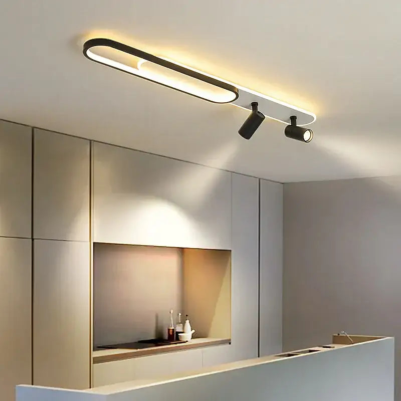 Modern black decorbites led ceiling light with sleek elongated design and two adjustable spotlights for living spaces
