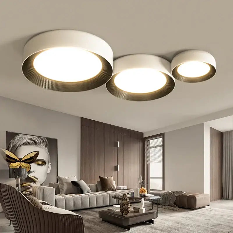 Modern three-light ceiling lights with white and brushed gold finish and concentric ring shades by DecorBites LED ceiling