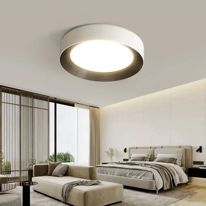 Modern dimmable decorbites led ceiling lights with white outer ring and metallic concentric circles around illuminated center