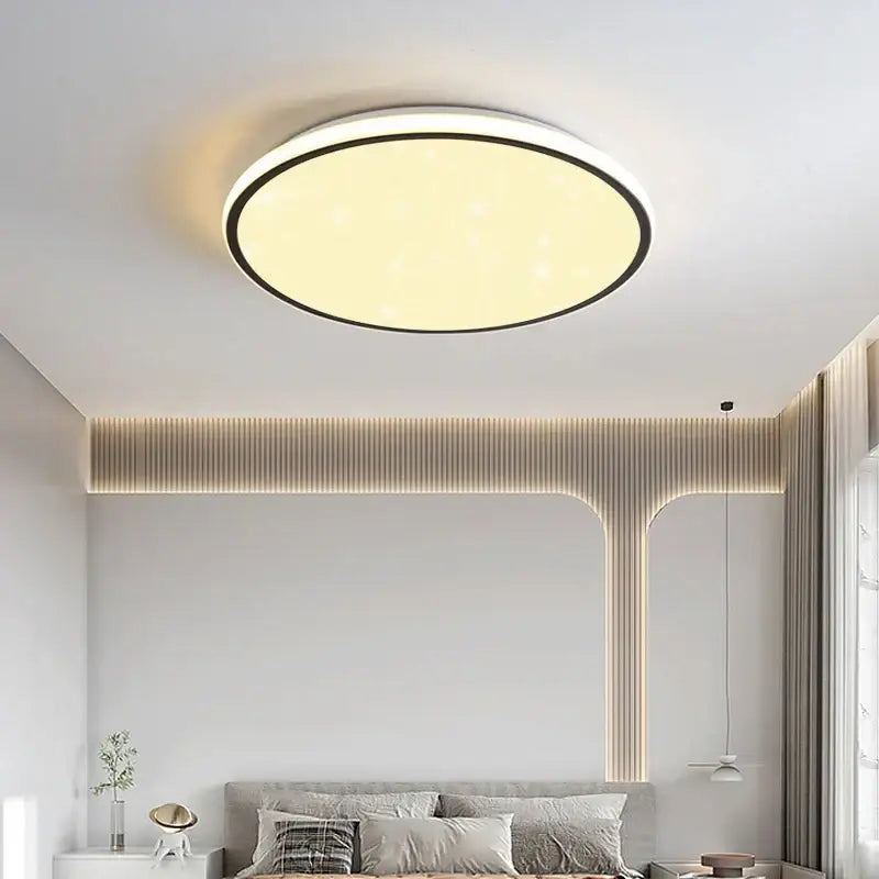 Modern circular DecorBites LED ceiling lights with warm yellow glow and black rim for living room and bedroom lighting