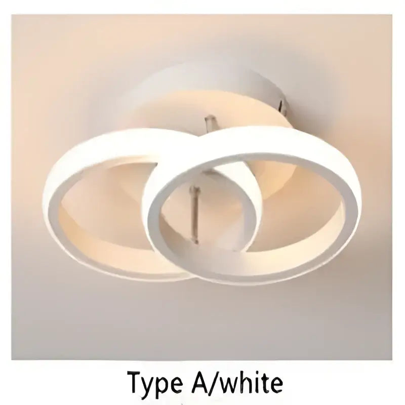 Black square decorbites led ceiling light with two interlocking white illuminated rings for modern home lighting