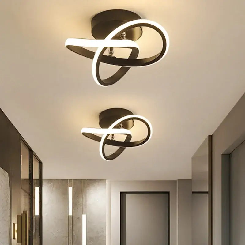 Modern black and white decorbites led ceiling light with sleek intertwined ring design for bedroom and living room