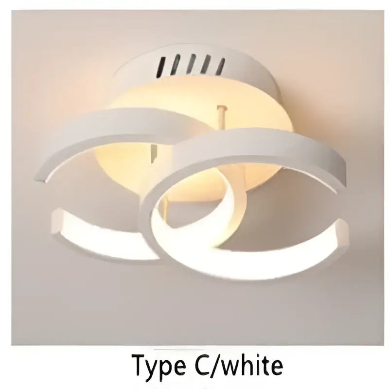 Decorbites led ceiling light with three overlapping white circular rings and warm glowing illumination for modern homes