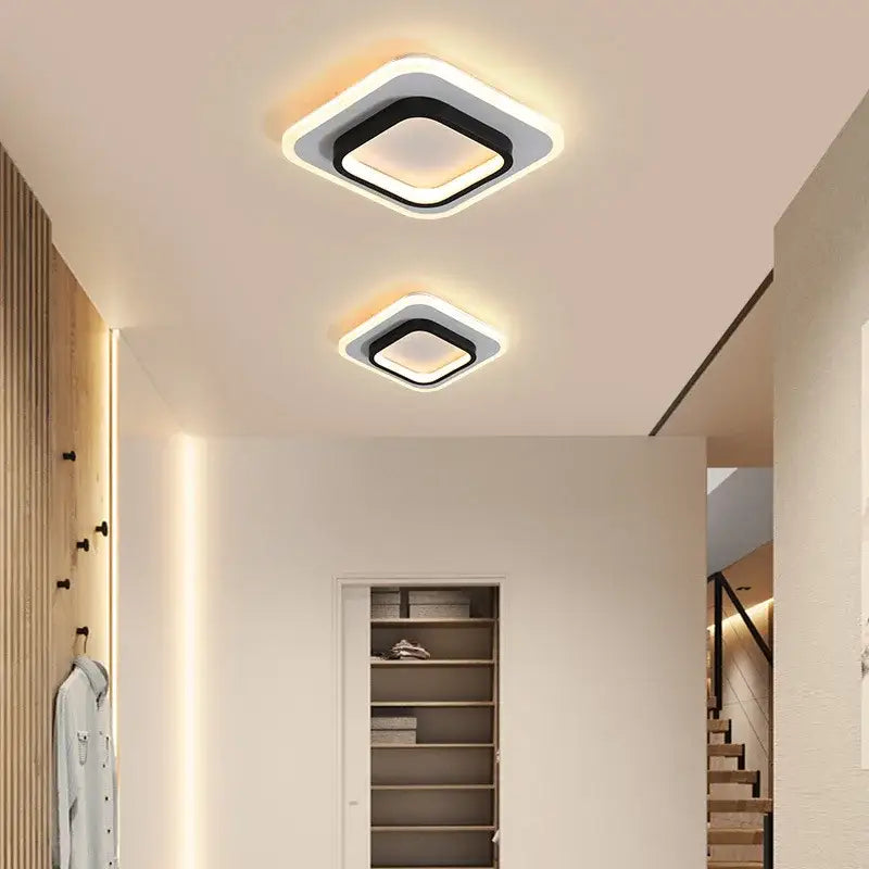 Modern square decorbites led ceiling light with black and white frame emitting warm ambient glow for home lighting